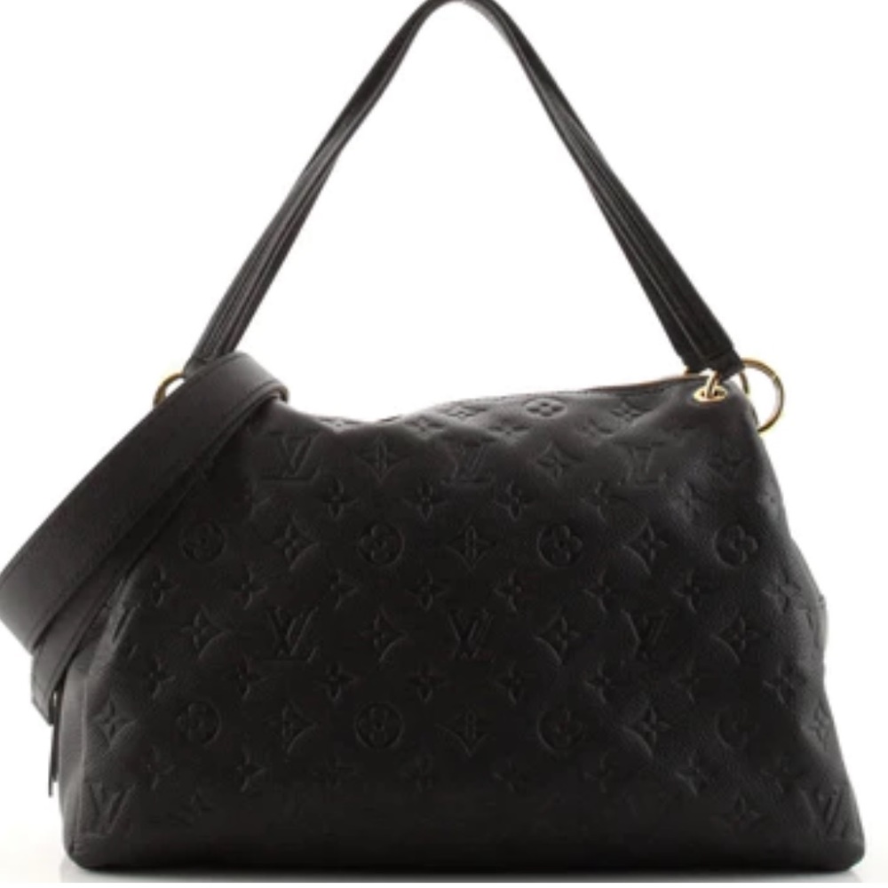 Louis Vuitton GENUINE LEATHER bag with detachable strap.
